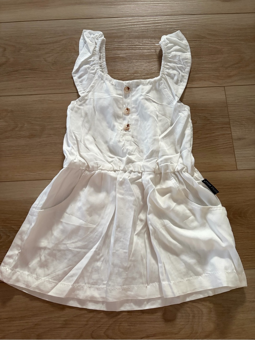 Little Bipsy White Ruffle Shoulder Dress